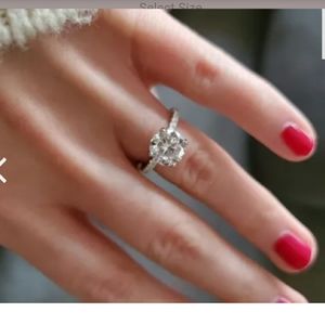 Tigergems 2.25ct round ring size 4.5